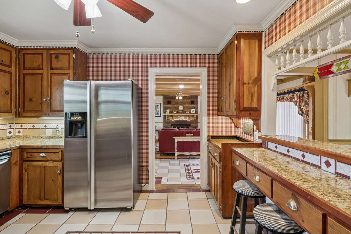 View from kitchen into family room/den.
