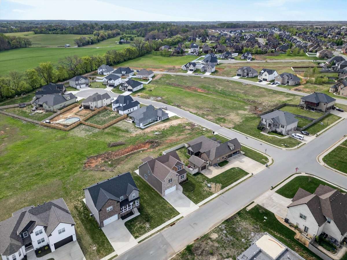 Expansive aerial view of neighborhood and surrounding area