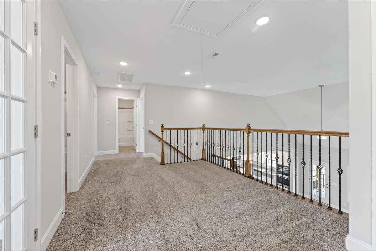 Open upstairs landing overlooking main living area