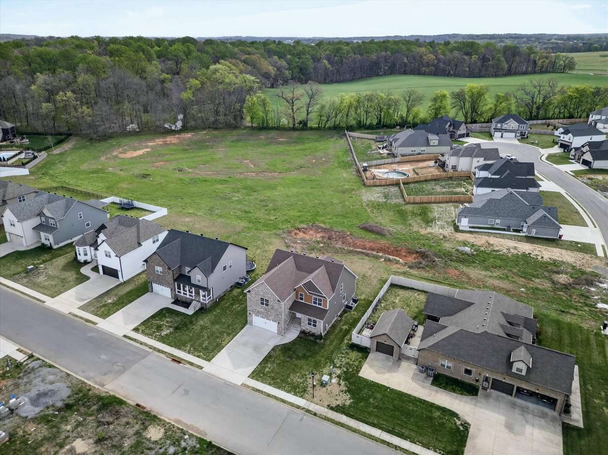 Aerial view highlighting community layout with open green space