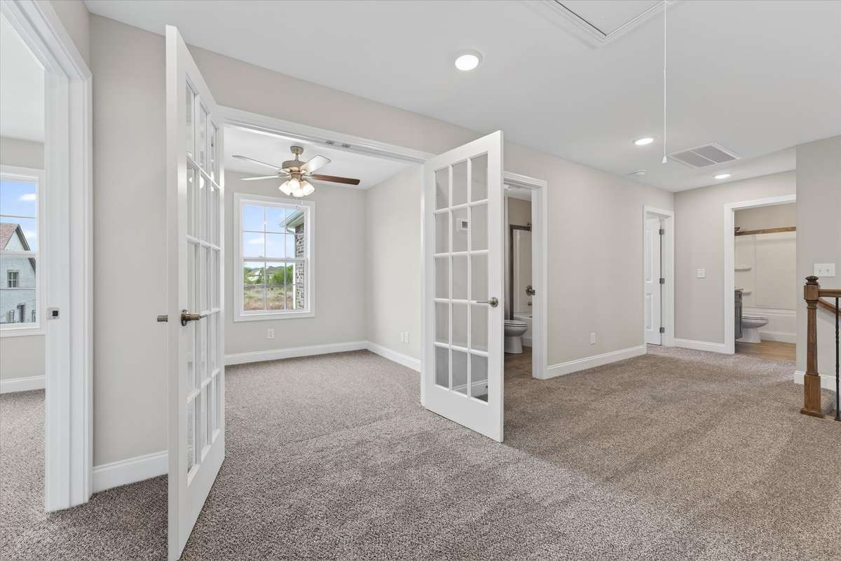 Versatile flex space—ideal for home office, study, or additional living area