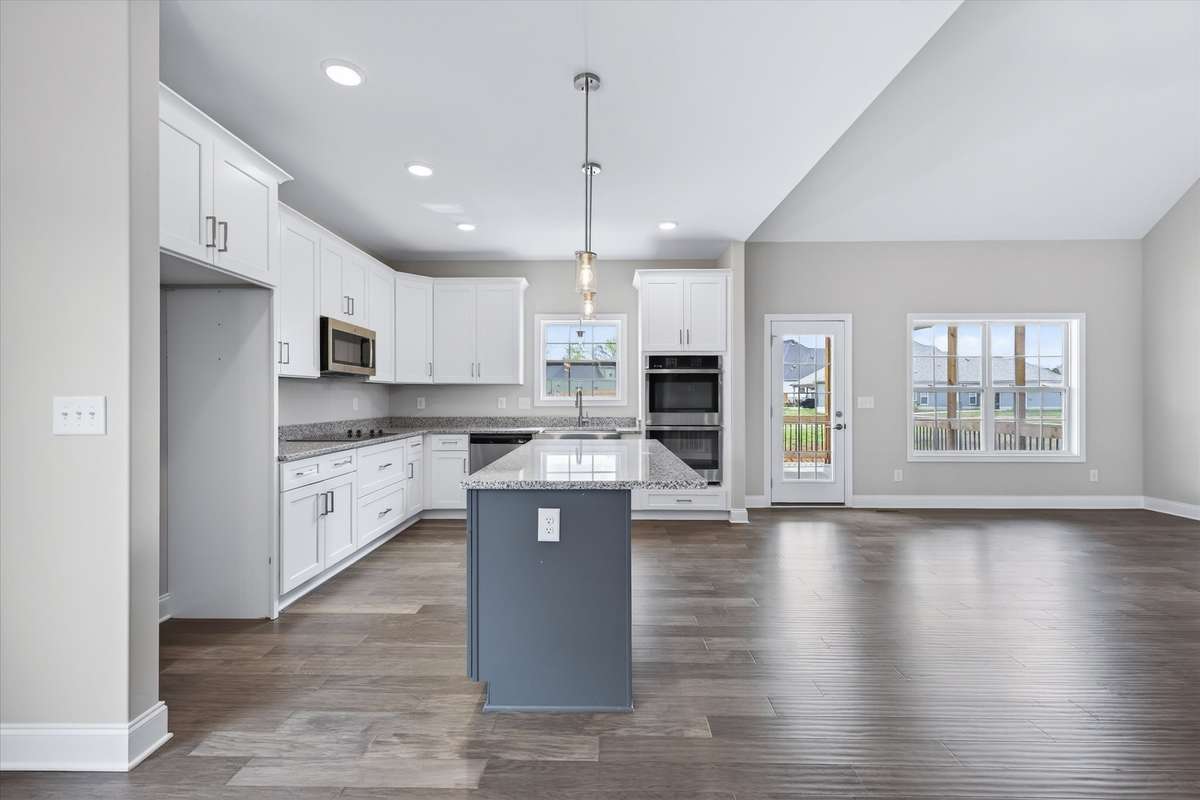 Large center island with seating and ample prep space