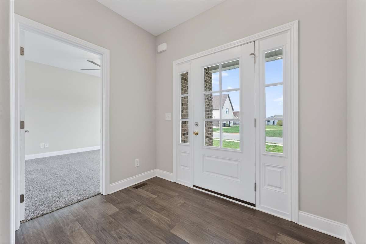 Private office or flex space with French doors just off the entry