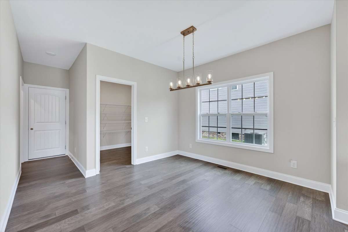 Light-filled dining area with easy access to kitchen and backyard