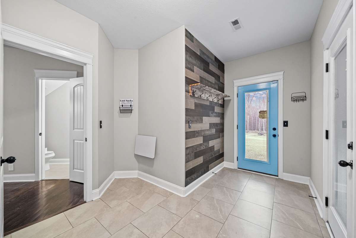 Utility Room next to half bathroom