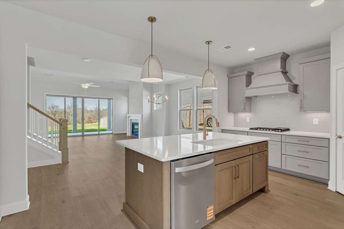 Don't miss out on what's happening in the opther room in this open floorplan