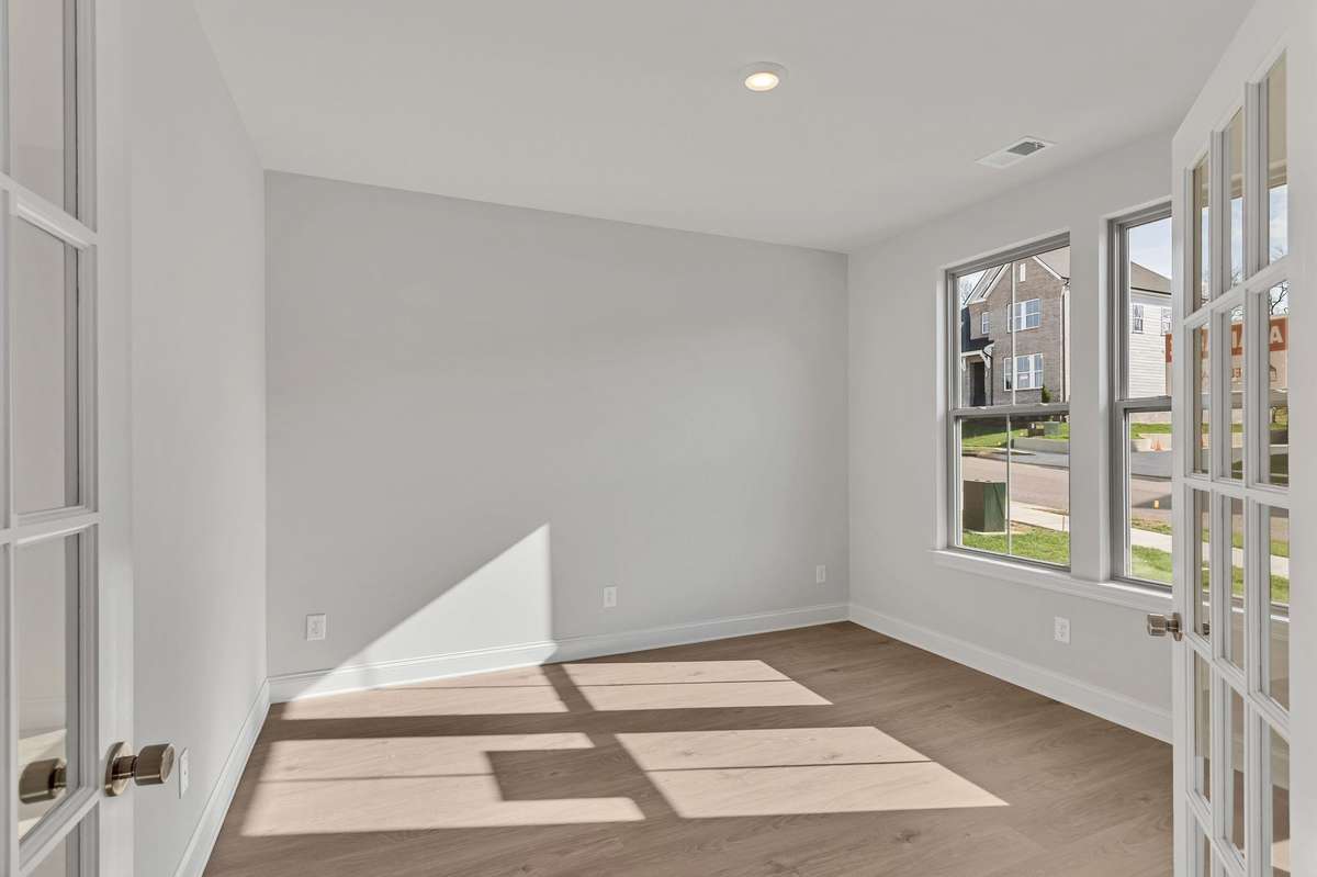 Enjoy doing your work in this light filled study/office with french doors