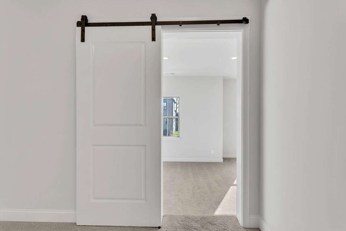 Sliding door leading to bonus room