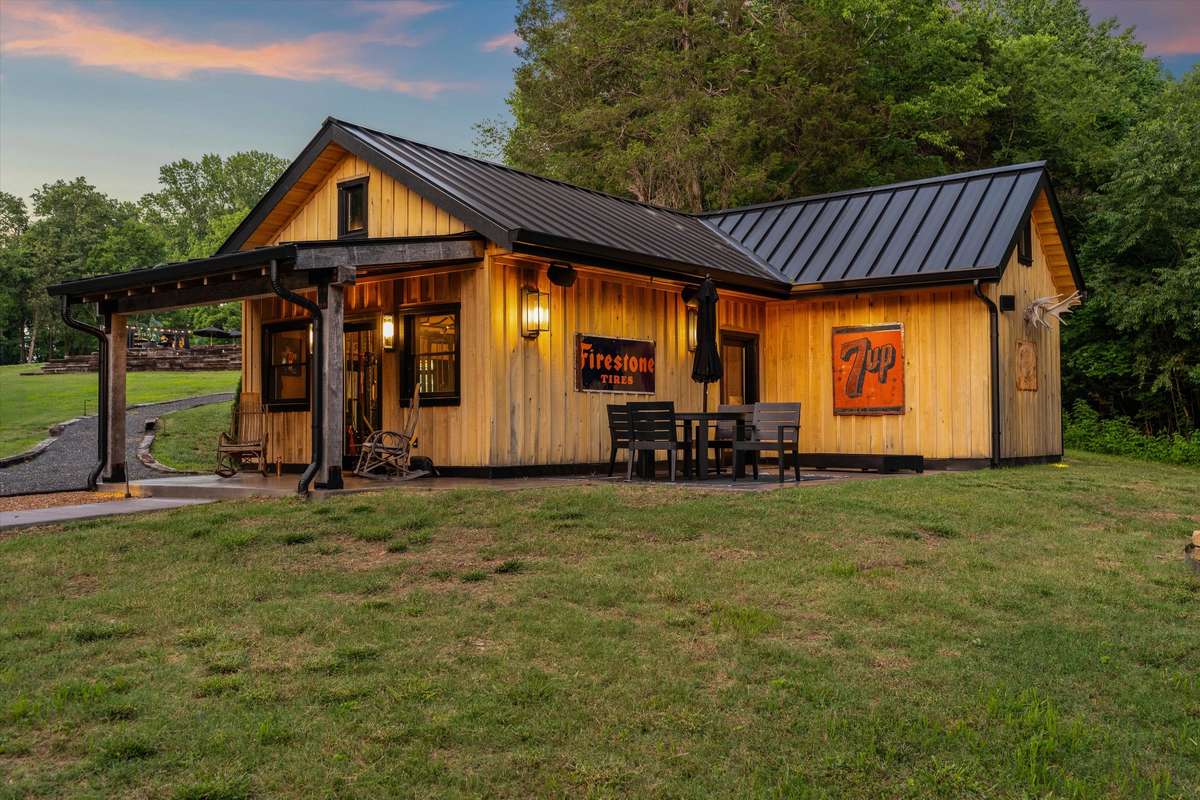 Completely renovated barn, currently a gym with extra room, bath and laundry, and sleeping loft.