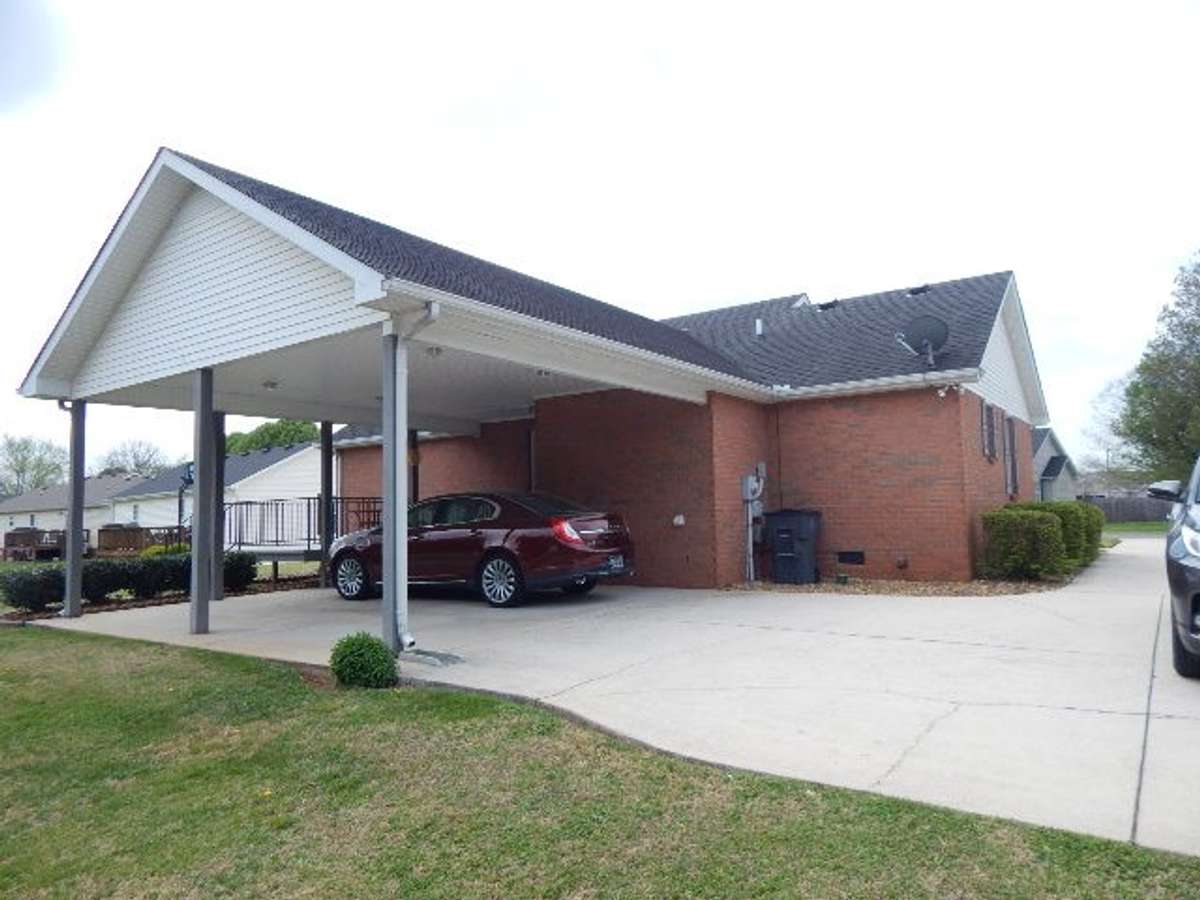 Large 2 car attached carport off the back and entrance from 2 different doors