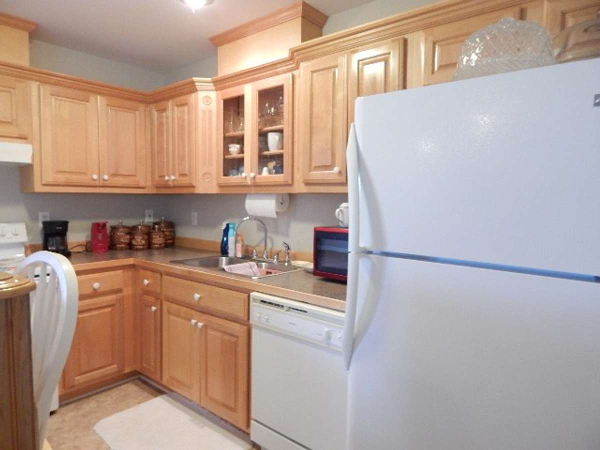 This kitchen has ample storage and counter workspace.