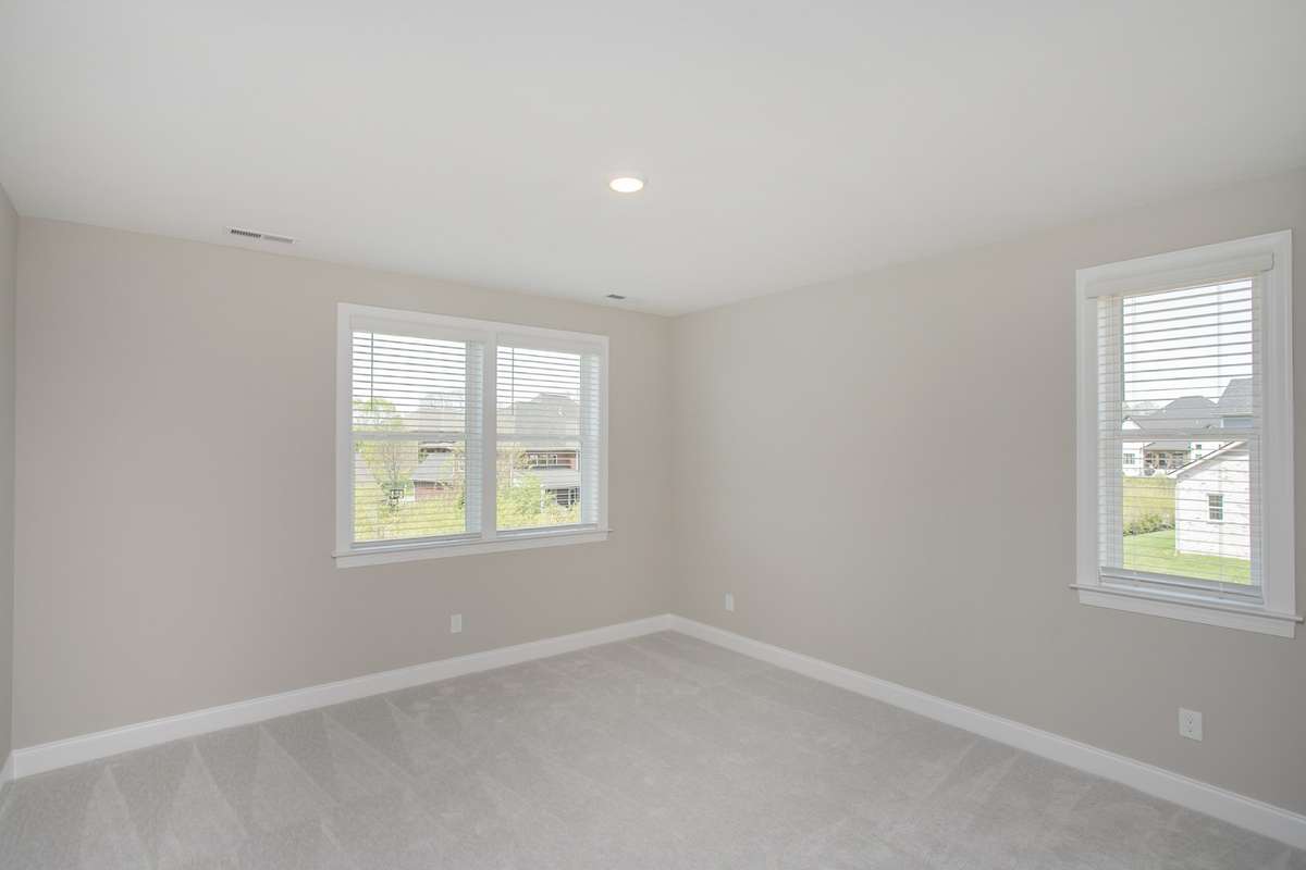 Bedroom 5 with walk in closet and private bath