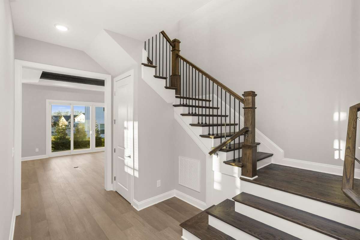 Stairs located off the front hall with nice closet storage