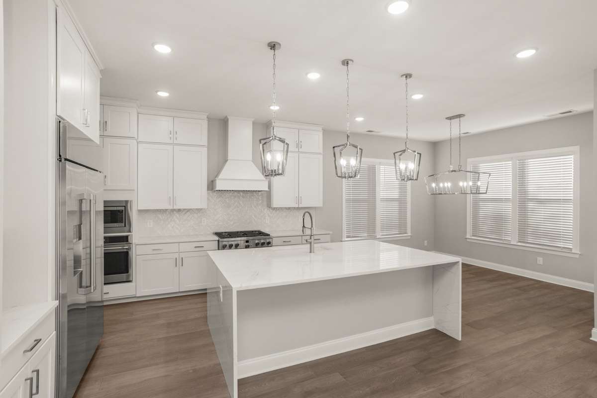 Another view of the kitchen and dining area off the kitchen