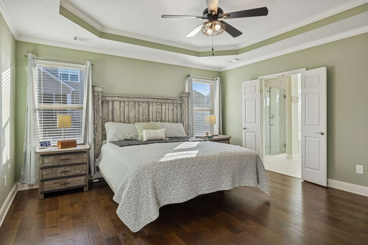 Private main-level primary suite offering comfort and convenience.