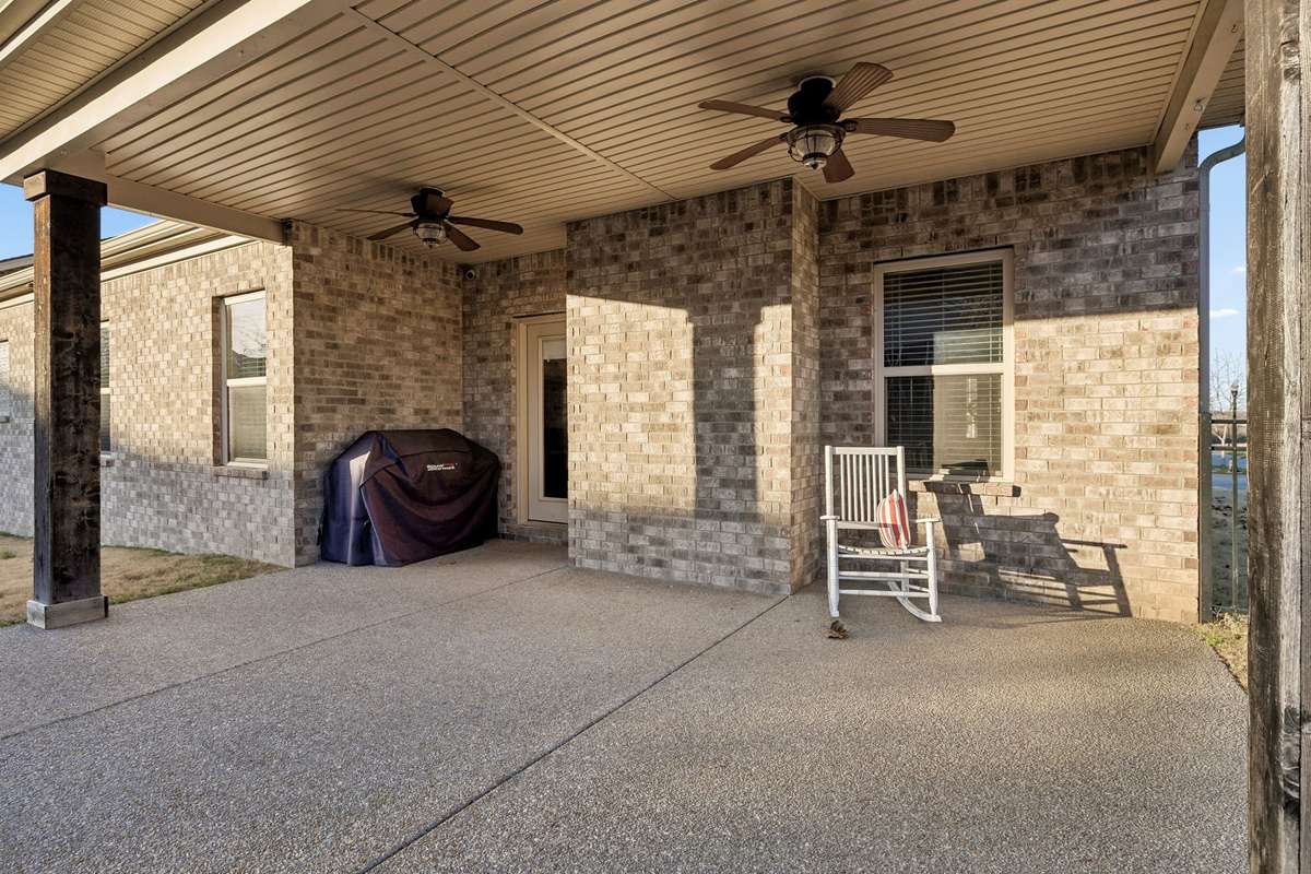 Expansive covered porch—perfect for outdoor dining and relaxing year-round.