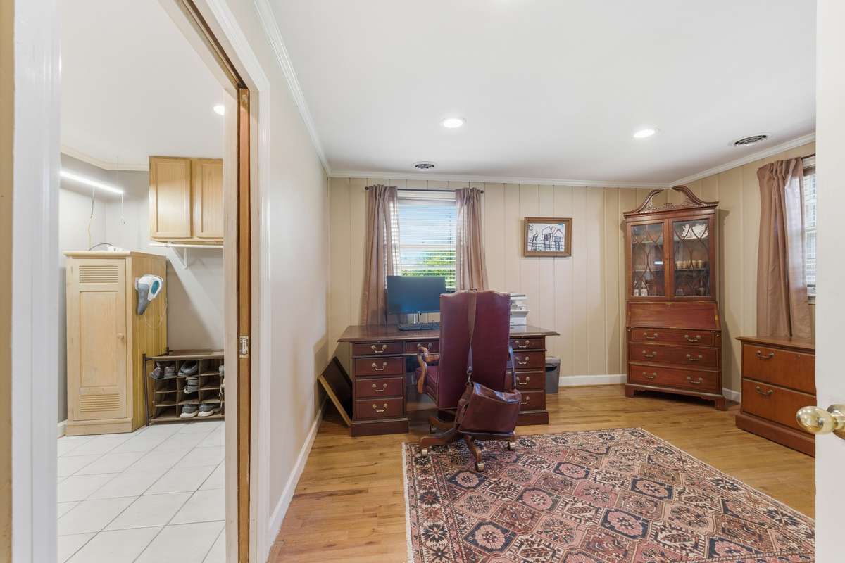 The office is located beside the spacious laundry room