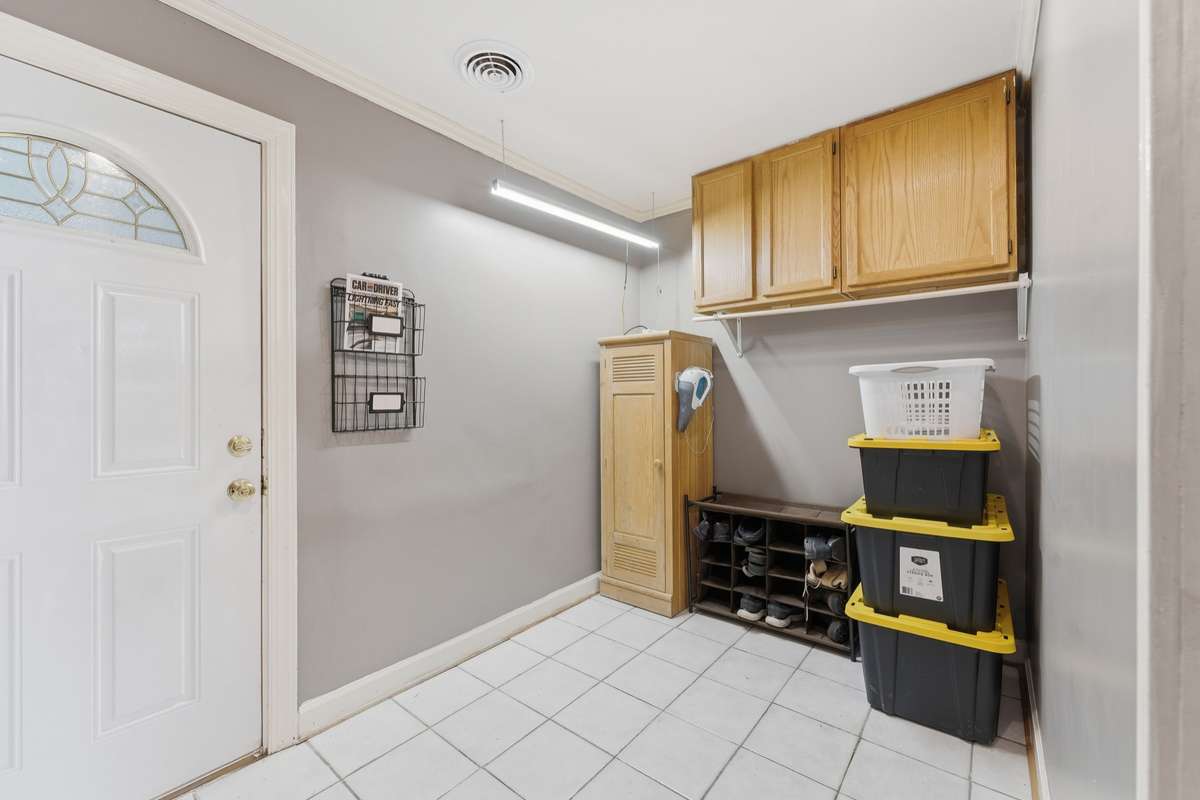 Tile floor in the laundry room as you walk in from the attached 2 car garage