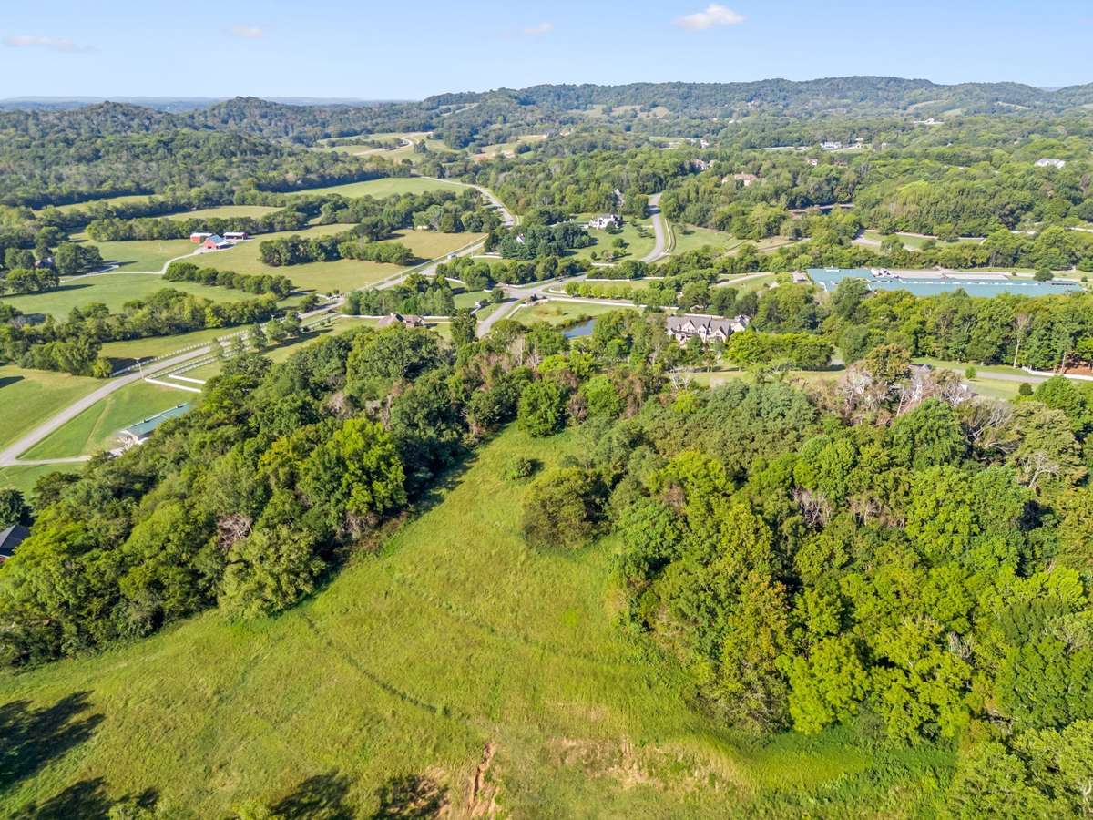 Enjoy breathtakingly high views of the rolling Tennessee hills on this picturesque 5-acre private estate