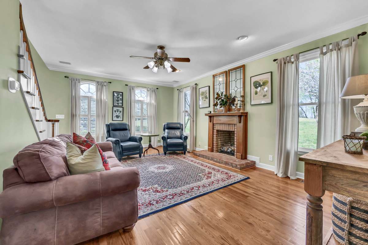 Another view of the spacious living room + plantation shudders will remain.