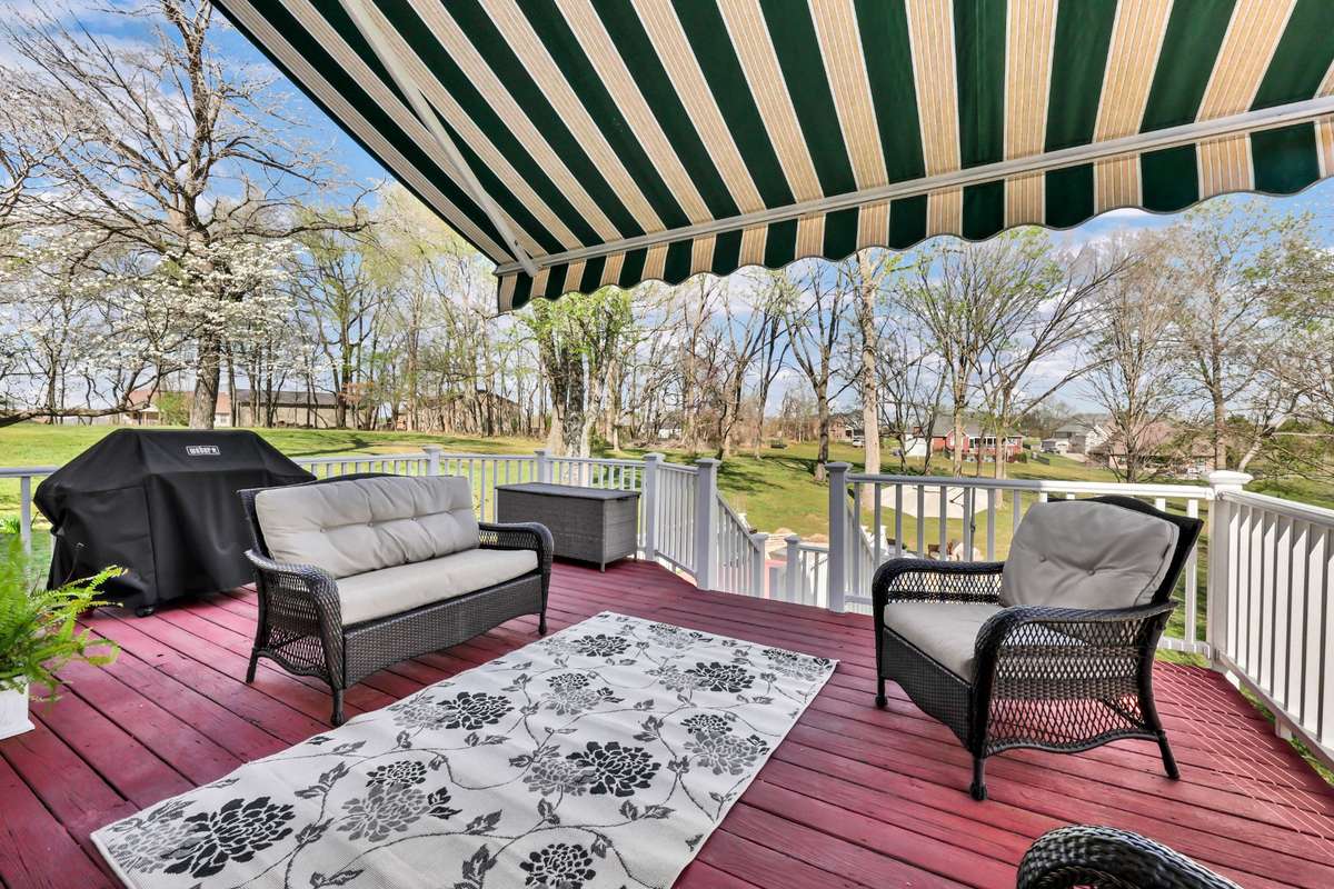 Step out back & enjoy the view. The back deck includes retractable awning + heater