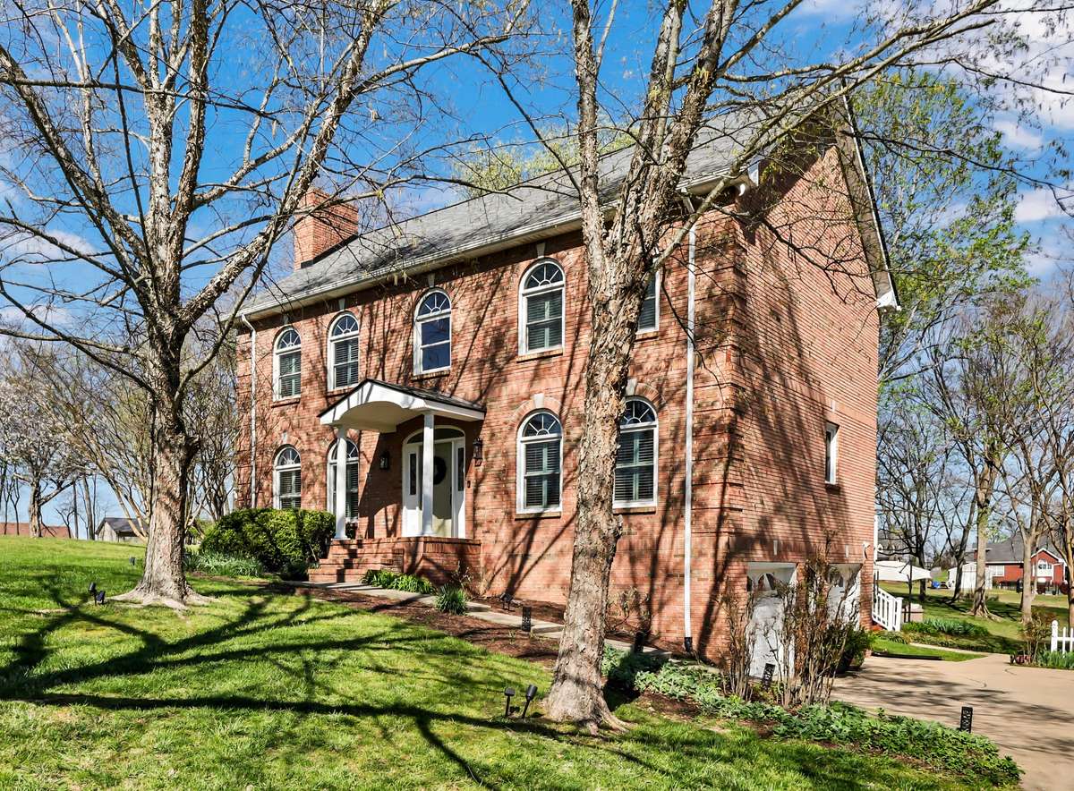 Covered front entry adds charm to this traditional design