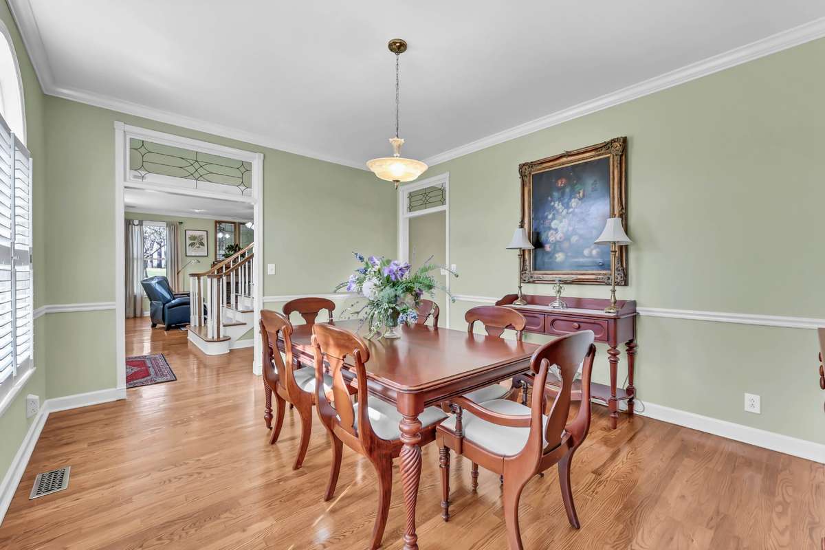 The formal dining room with plenty of natural light