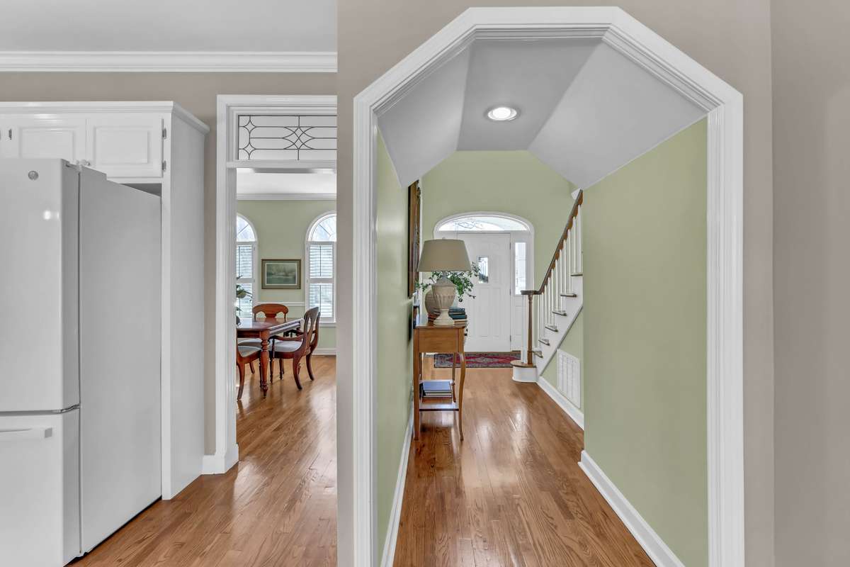 It's all in the details! From beautiful archways to the glass panels over the doorways.