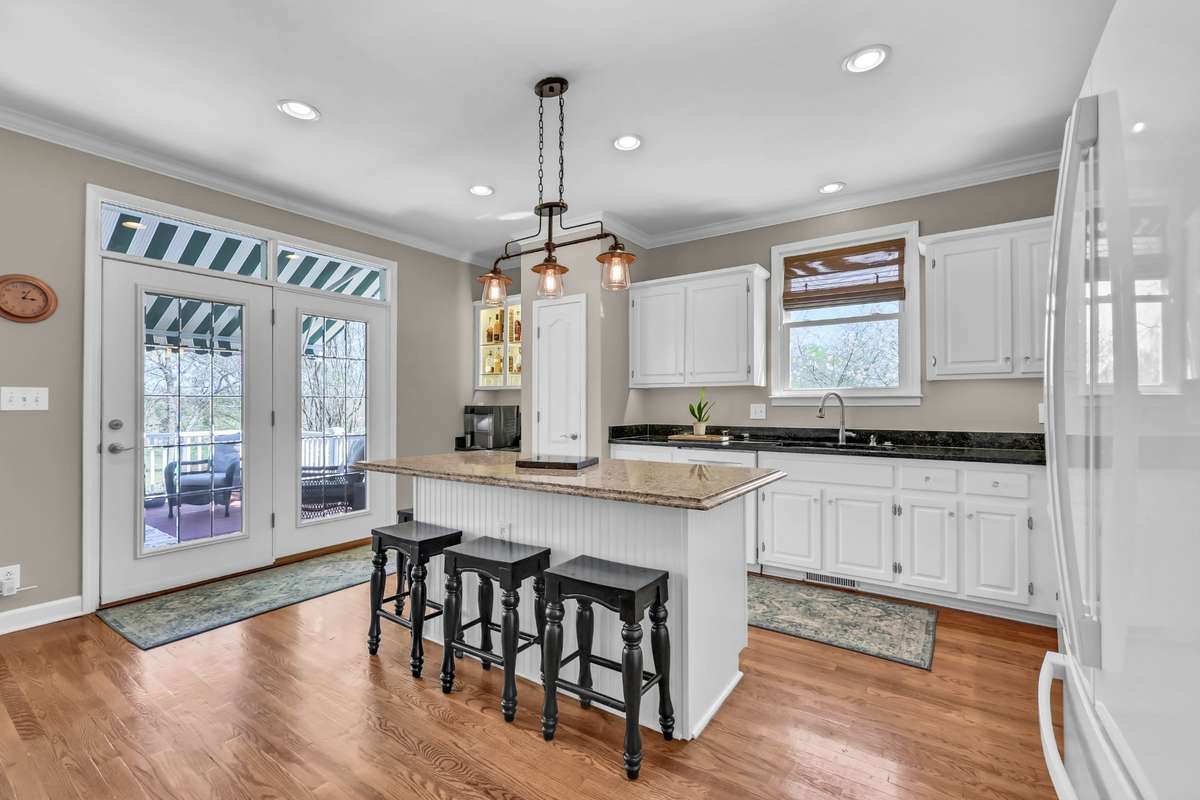 Bright and functional kitchen with access to outdoor living