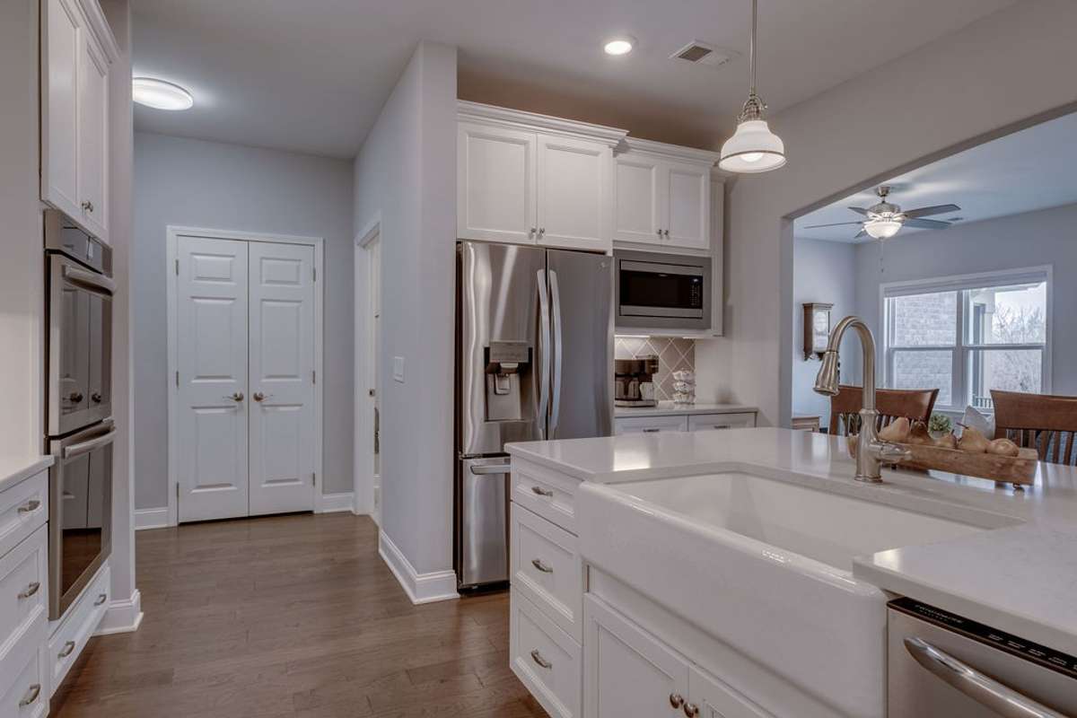 Upgraded Gourmet Kitchen with Double Oven, Farmhouse Sink & Quartz Countertops