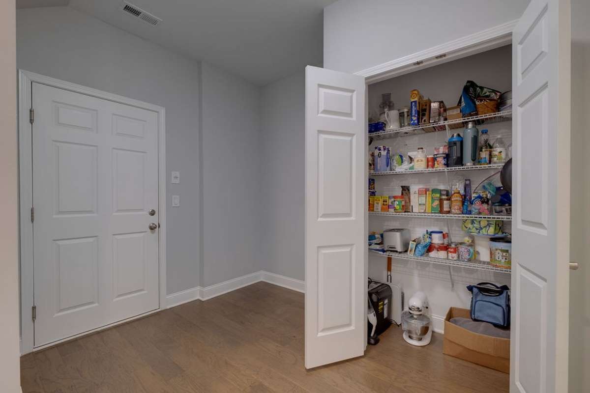 Garage Entry with Drop Zone (ready for custom built-in!) and large Kitchen Pantry!