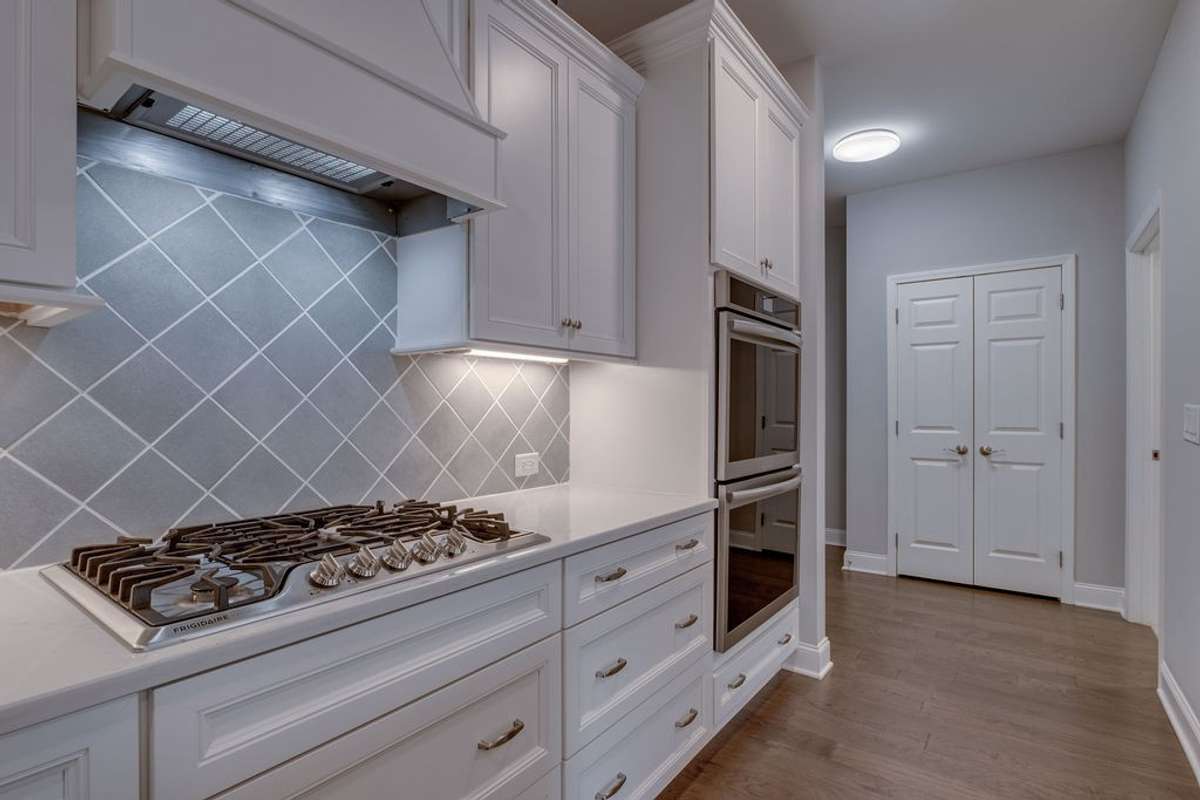 Upgraded Cabinets, Cooktop & Double Oven