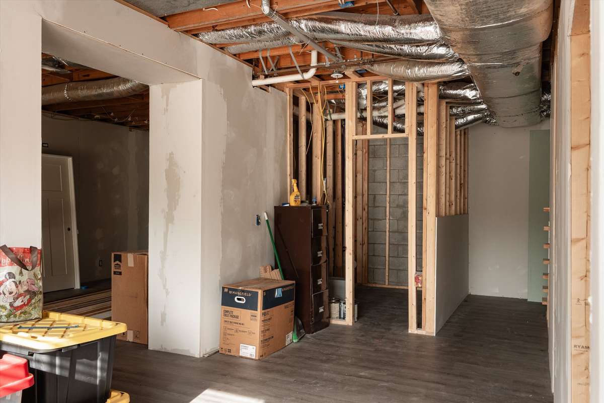 Framing and plumbing are in place for a full bathroom