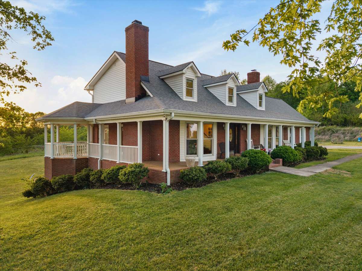 Enjoy sunrises from the front porch and unwind with sunsets out back, all from the wraparound porch
