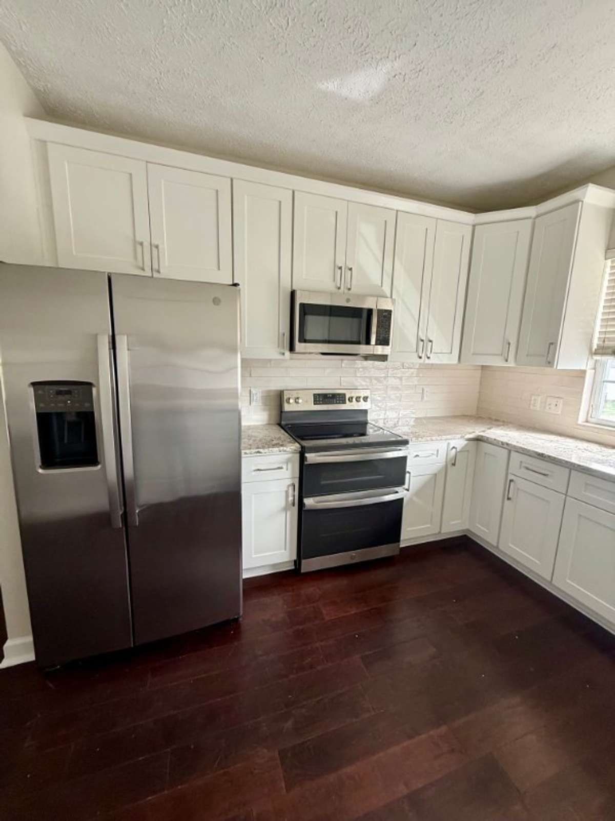 Updated kitchen with stainless appliances