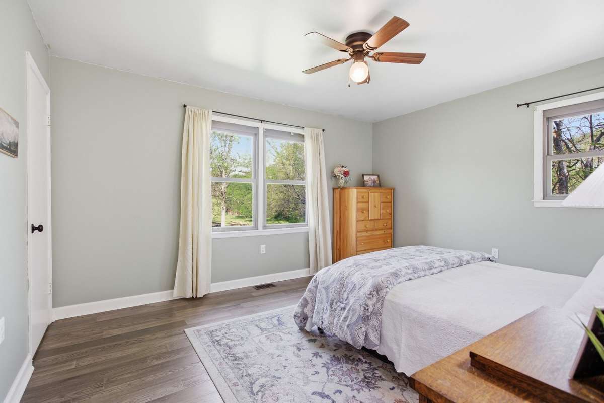 Another view of the primary bedroom.