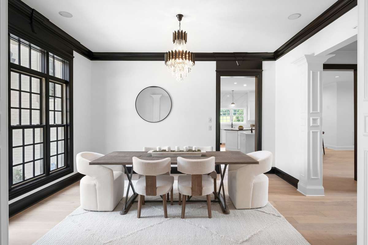 In this open floor plan walls disappear and you are in the gracious formal dining room.