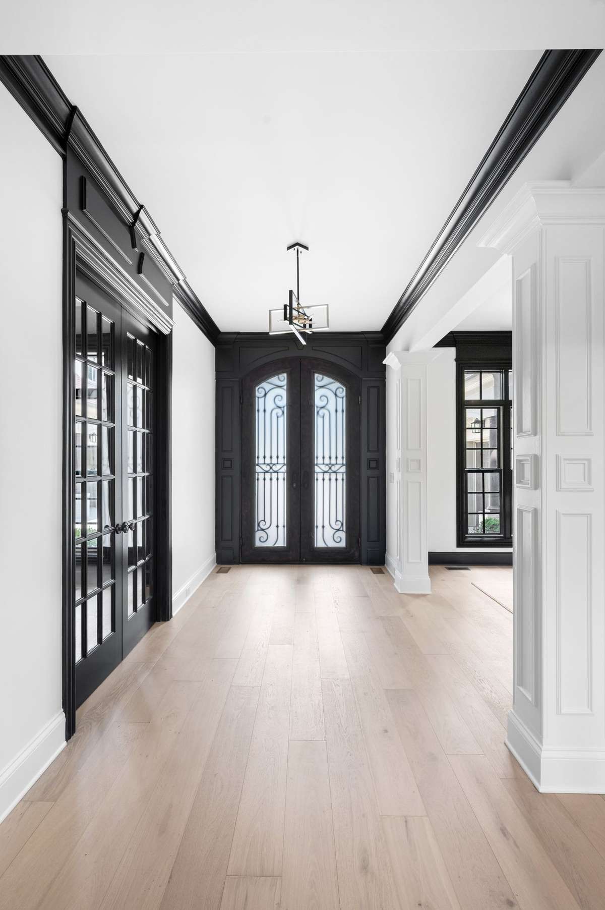 Brand new floors and custom finishes greet you when you walk into the foyer.