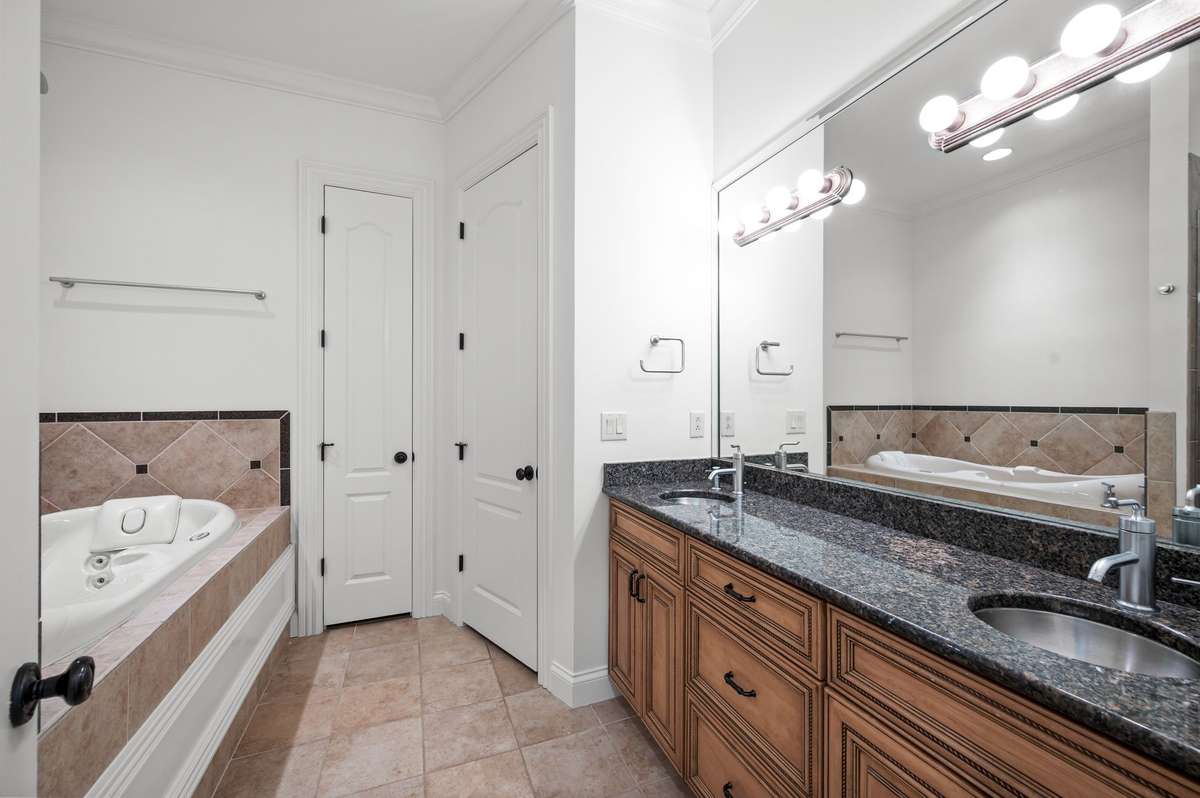 Whirlpool tub and double vanities.