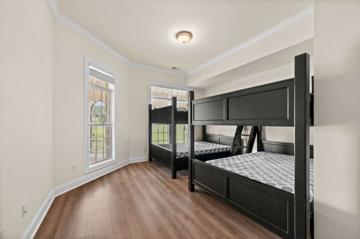 One of two terrace level bedrooms.  This one is a bunk room with four beds. (bunks remain)