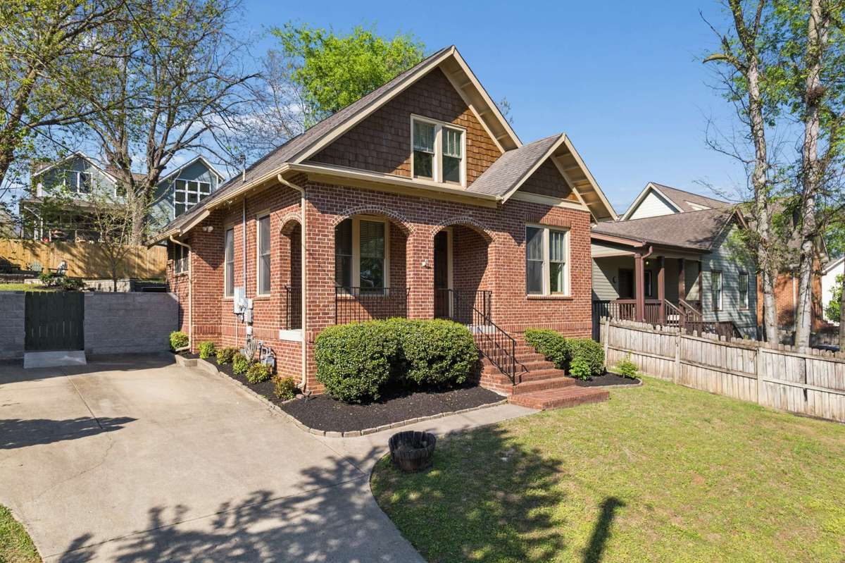 Freshly painted trim, beautiful landscaping, this darling East Nashville home oozes curb appeal!