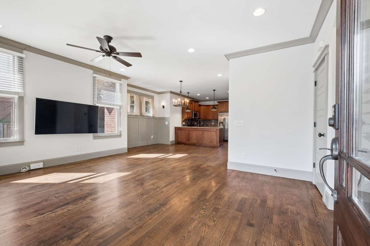 Sand and finish hardwood floors, abundant natural light and lots of storage await you!