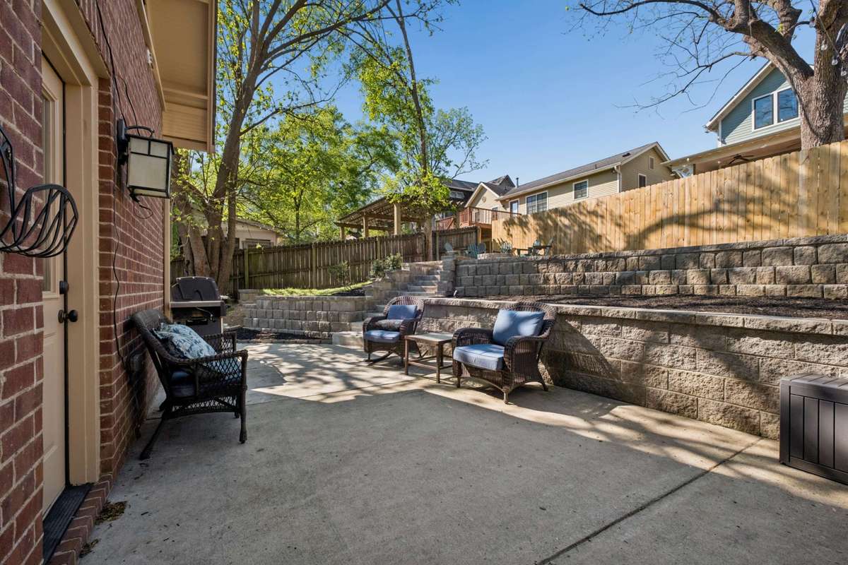 The back yard is a true sanctuary - just waiting for company to grill and spend evenings around the fire pit!