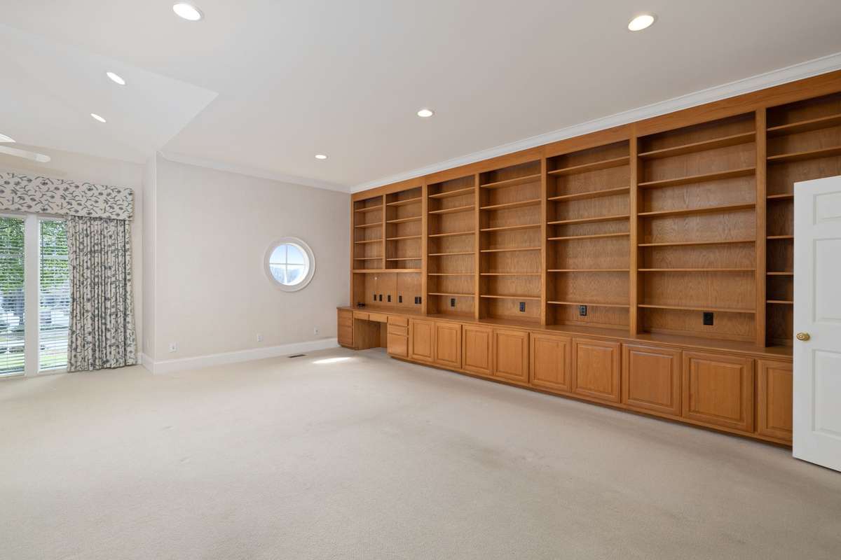 Main level family room with close proximity to kitchen--so convenient!