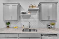 Custom Floating Shelves above Sink & Tiled Backsplash.