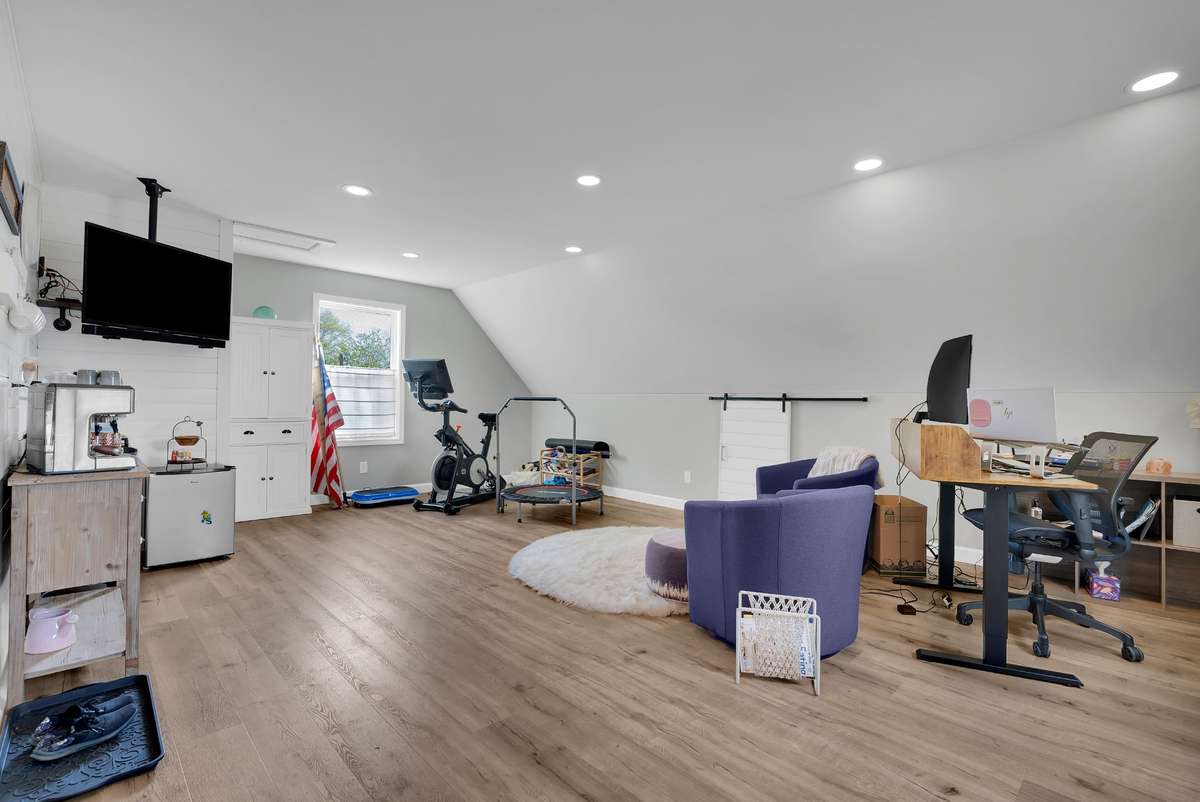 Almost 400 finished sqft on upper level of garage.