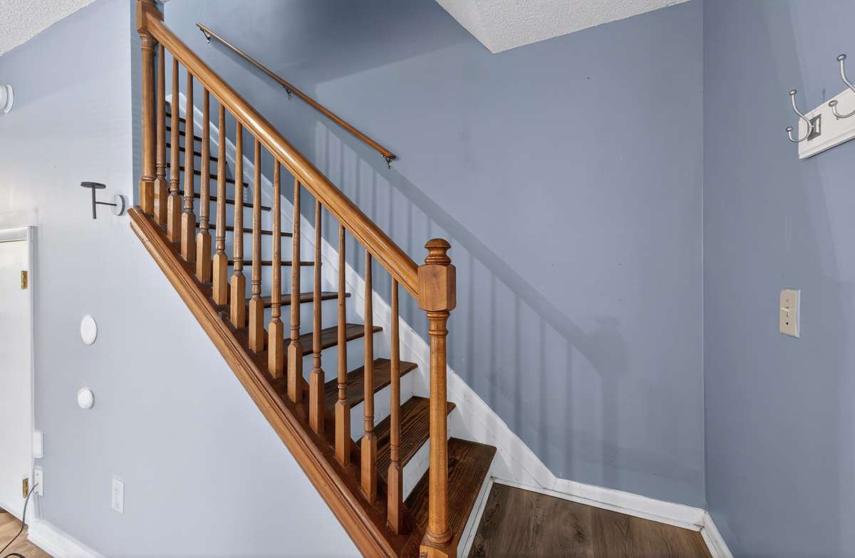 Staircase to Second Floor with Additional Storage Underneath