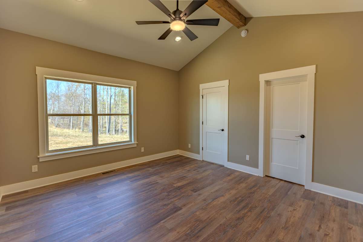 Primary Bedroom with Cathedral Ceilings.