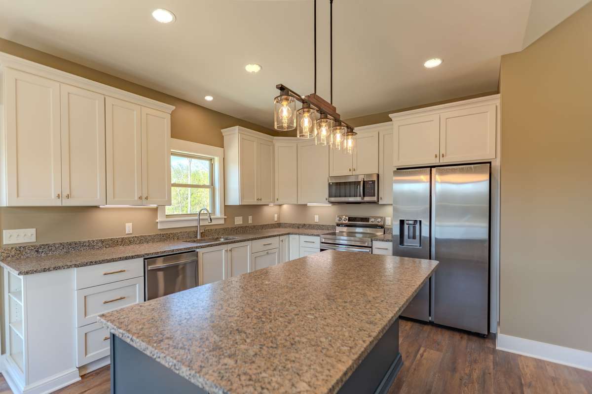 Counter tops are leather finished quartz.