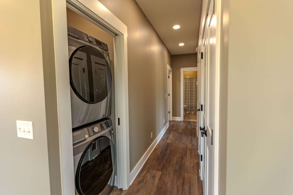 Stackable Samsung Washer & Dryer included.